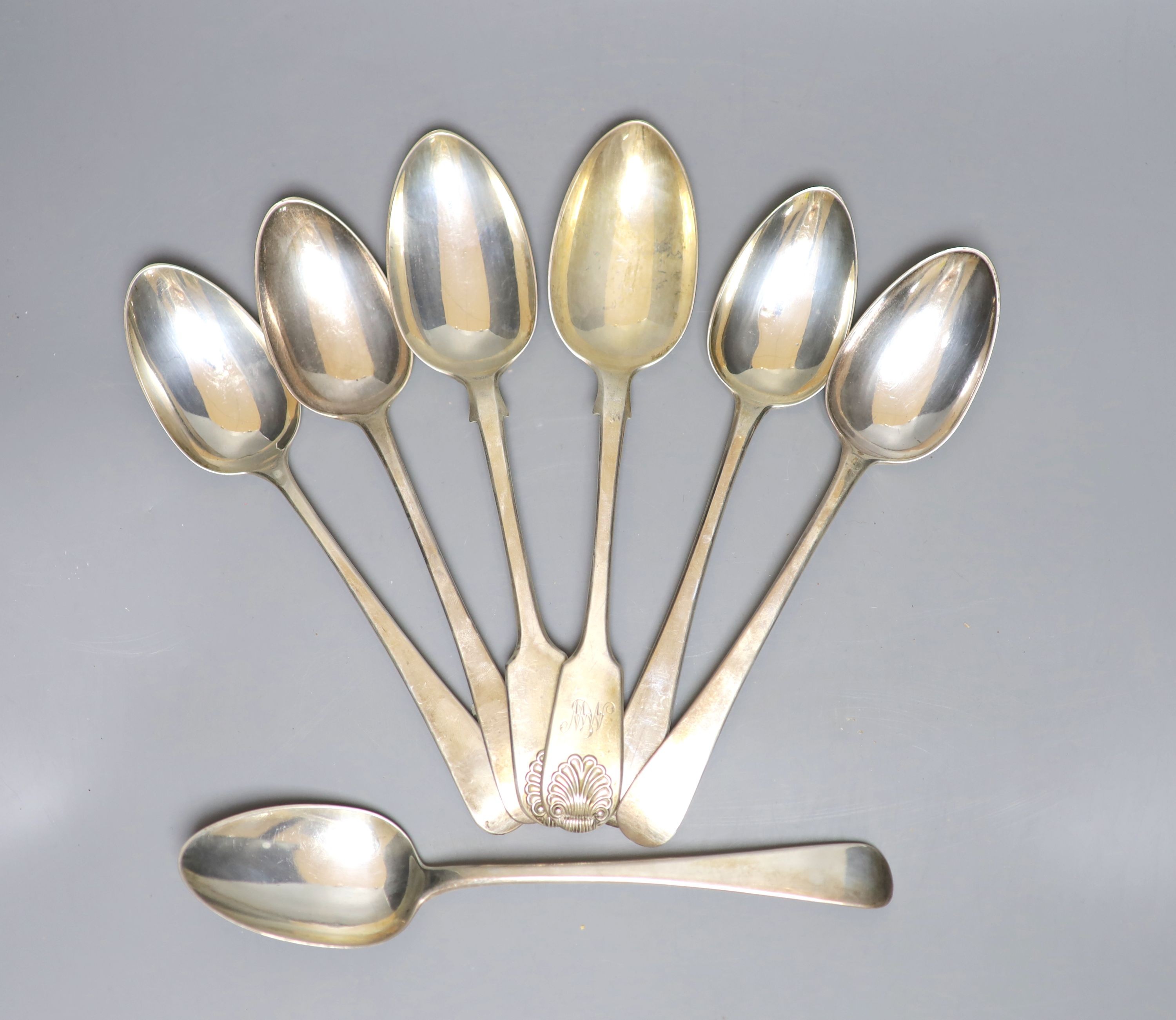 Seven assorted 18th and 19th century silver tablespoons, various patterns, dates and makers, 15oz.